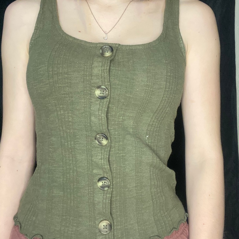 Green tank with buttons